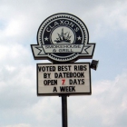 The Claxon Smokehouse sign - Voted Best Ribs by Datebook